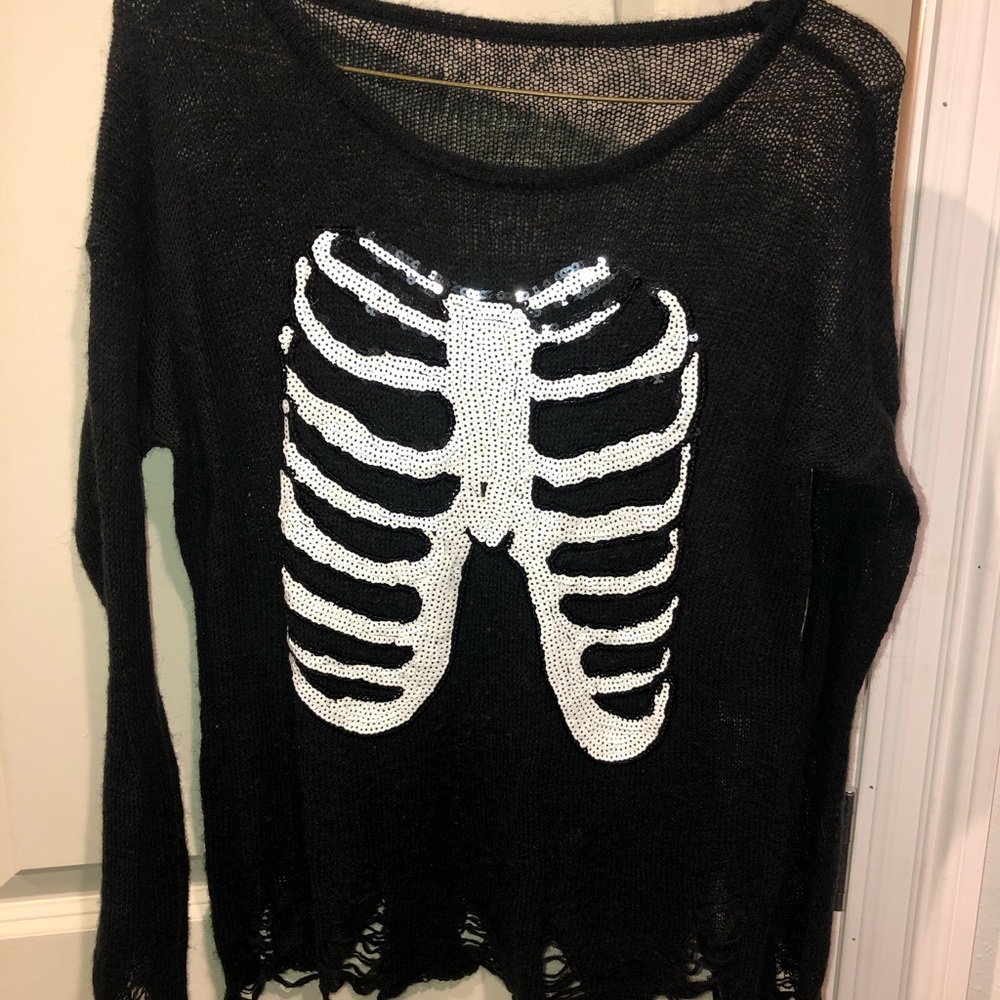 Distressed skeleton sweater
